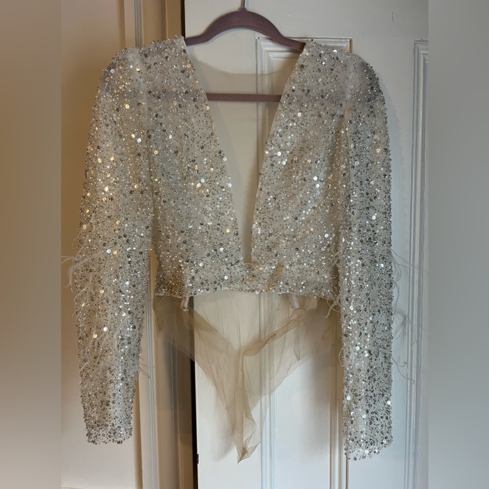 Sparkle and feather embellished custom made top, fits like a small